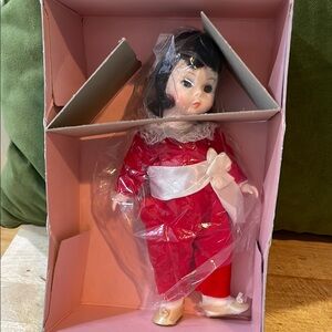 Madame Alexander red boy doll in original box.